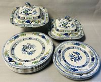 Photo showing complete set of Mason's Temple England ironstone dishes including 2 covered serving vegetable dishes, multiple large, medium, and small plates in floral blue and green pattern.