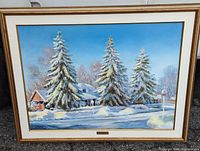 Frontal view of the framed winter landscape oil painting "First Snowfall" showing the full artwork, frame, and mounting hardware.