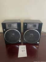 Pair of Fisher PH402 speakers positioned side by side showing full front view.