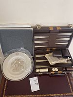 Full view of backgammon set and commemorative Philadelphia plate in packaging.
