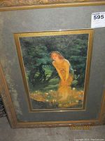 Full view of framed print showing girl fairy in forest clearing with glowing orbs, gold-toned decorative frame