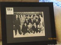 Framed black and white group photograph of boxers and personalities at St. Nicholas Arena, NYC.