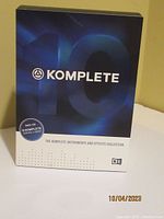 Front view of the Komplete 10 collection box showing branding and collection title.