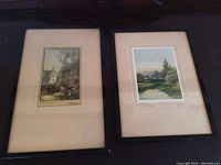 Photo of two framed landscape art prints together, showing condition and appearance including mattes and frames