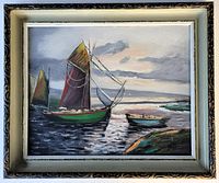 Full view of framed oil on canvas painting showing two sailboats and a rowboat on water with rocky shore and cloudy sky at sunset.