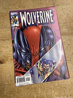 Front cover photo of Wolverine Volume 1 #155 comic book showing artwork of Wolverine with a purple background.