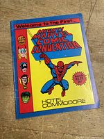 Front cover showing colorful design with Spider-Man, text Welcome to the First Mighty Marvel Comic Convention, date and location details