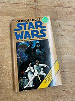 Front cover of Star Wars book showing characters and title