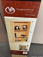 Boxed Vaughan Woods Limited bookcase showing front with size and shelving details.