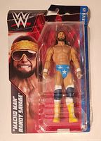 Front view of WWE Macho Man Randy Savage figure in packaging showing figure details and front box art