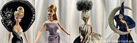 Four Barbie dolls shown in a row from left to right against a white background, allowing view of each doll's detailed gown and accessories.