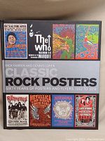 Front cover of 'Classic Rock Posters' book showing a collage of famous rock posters including The Who, Metallica, Nirvana among others, indicating the book's subject.