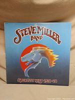 Front cover of Steve Miller Band Greatest Hits 1974-78 vinyl record featuring horse head artwork and title.