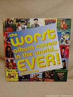 Photo of the book cover titled 'The Worst Album Covers in the World EVER!' showing multiple bad album cover images around the border.