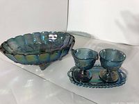 Full set showing 2 blue Viking wine glasses, footed fruit bowl, and rectangular serving tray with iridescent finish