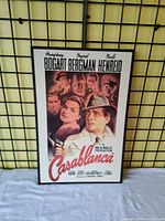Frontal view of Casablanca movie poster showing full artwork and text.