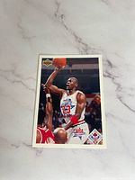 Front of the Michael Jordan basketball card showing him in an All-Star game action pose.