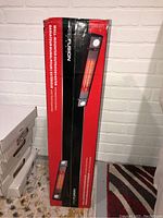 Full view of the sealed product box showing brand, product type, and packaging condition.