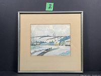 Framed watercolour painting showing overall winter rural scene with snow and distant hills.