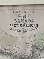 Close-up photo showing map title 'Imperial Map of Canada and Arctic Regions of North America 1849' and publisher 'Robert Caldwell Edinburgh'.