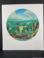 Front view of one lithograph from the set showing the underwater coral reef scene featuring tropical fish under a blue sky with a rainbow, within a 20-inch diameter circular image on a 28 x 25 inch sheet.