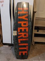 Full front view of the Hyperlite wakeboard, showing brand name and general condition.