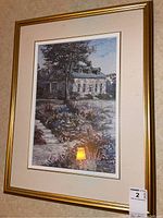 Full view of the framed and matted Keirstead print showing a house with garden and pathway, within a gold frame.
