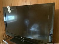 Full front view of the Sony 32-inch Bravia TV showing screen and bezel with Sony logo.