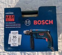 Closed box for Bosch 1/2 inch hammer drill model 1191VSR, blue box with drill image and specs.
