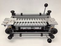 Front view of jig showing Porter-Cable branding and dovetail guide slots