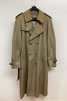 Front view of the beige Men's London Fog dress trench coat with double-breasted buttons and belt.