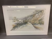 Full view of the framed landscape artwork showing the overall composition and frame style.