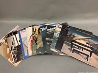 All vinyl records laid out with front covers visible, showing the mix of Heart, Bob Seger, Pat Benatar, and Supertramp albums.