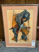 Frontal view of full framed print showing peach mat and silver frame