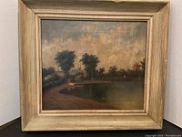 Frontal view of framed oil painting showing complete artwork and frame