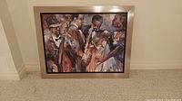 Full view of framed art piece showing jazz band scene with four musicians in warm colors without glass, leaning against a wall.