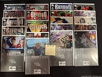 Photo showing 20 DC Comics with Booster Gold, Batman, Batman Beyond, Civil War, Front Line titles. Comics are bagged and boarded, arranged in rows.