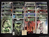 Full view of 20 bagged and boarded DC Comics featuring Green Lantern themes arranged on a white surface