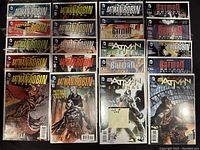 20 Batman-themed comic books arranged in rows, showing clear titles and characters on covers.
