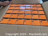 Box with 30 individually boxed orange light bulb packages inside a larger shipping case.