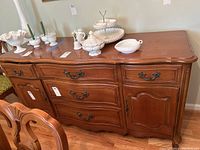 Full front view of buffet showing drawers, doors and hardware