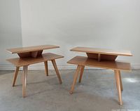 Front view of both tables showing full lot