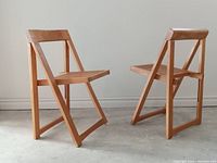 Two chairs angled view showing frame and cane seats