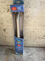 16-inch stainless steel washroom grab bar in original box showing product and branding details.