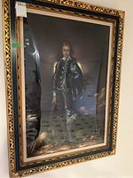 Full view of the framed painting featuring a child in historical clothing.