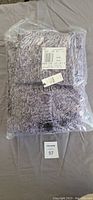 One sweater in original Talbots packaging, purple/white tweed knit, size 2X