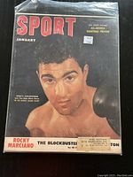 Front cover image of January 1953 SPORT magazine featuring Rocky Marciano in boxing pose with original price sticker on plastic protector.