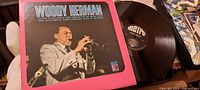 Photo of Woody Herman LP cover showing Woody Herman playing the clarinet.