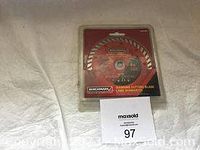 Benchmark 4.5 inch diamond cutting blade in original packaging, showing front packaging and branding.