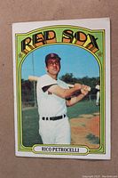 Front of 1972 Topps Rico Petrocelli baseball card showing player in Red Sox uniform with bat.